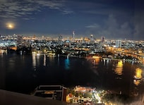23rd floor view of the moon over Chao Phraya
