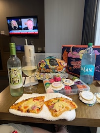 View from the table, a loaned wine glass from Moxies. Food from the core, queen bed room.