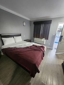 The AC gets real cold. The bed was not the most comfortable but it wasn't unbearable. The pillows were not fluffy.