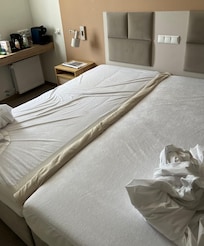The bed we got. Tried to fix it by putting a blanket in between.