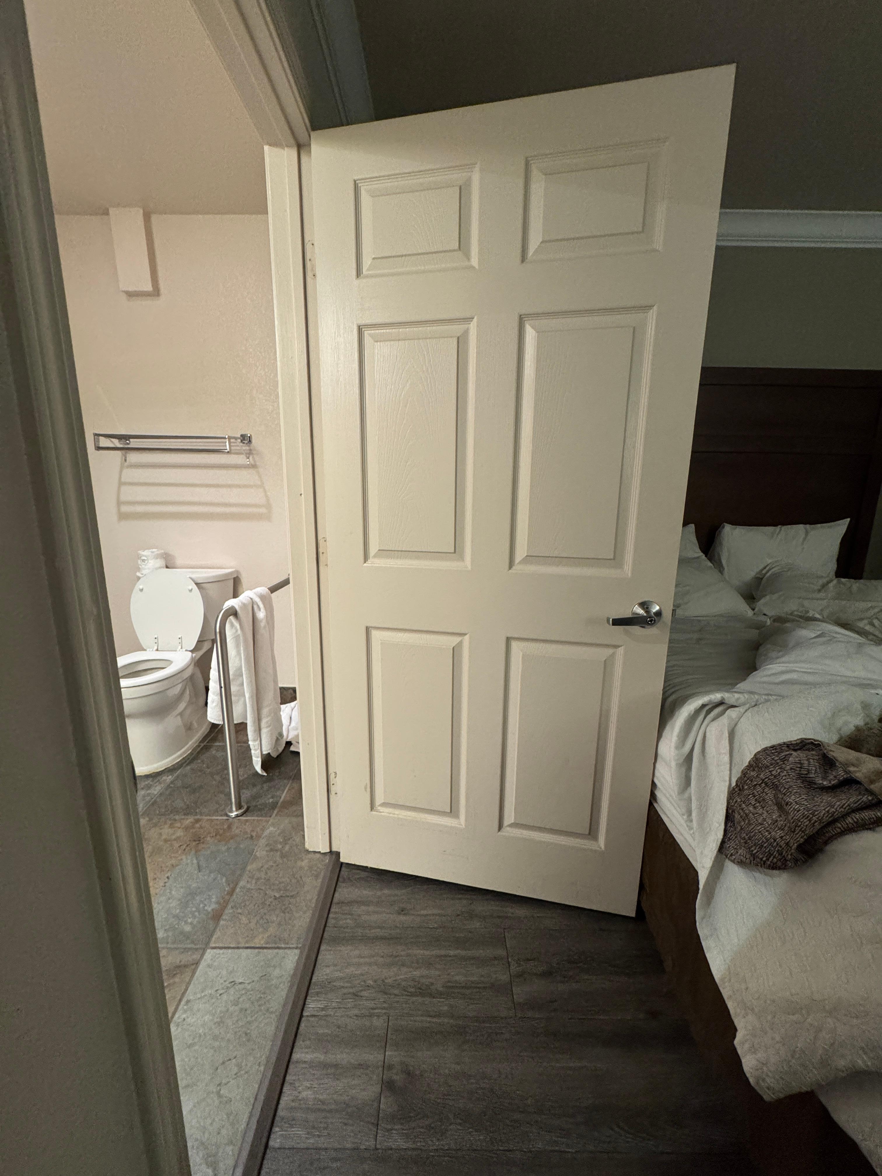 Door to bathroom opens only half way 