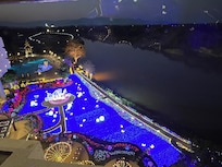 The illuminated gardens behind the hotel viewed from our room