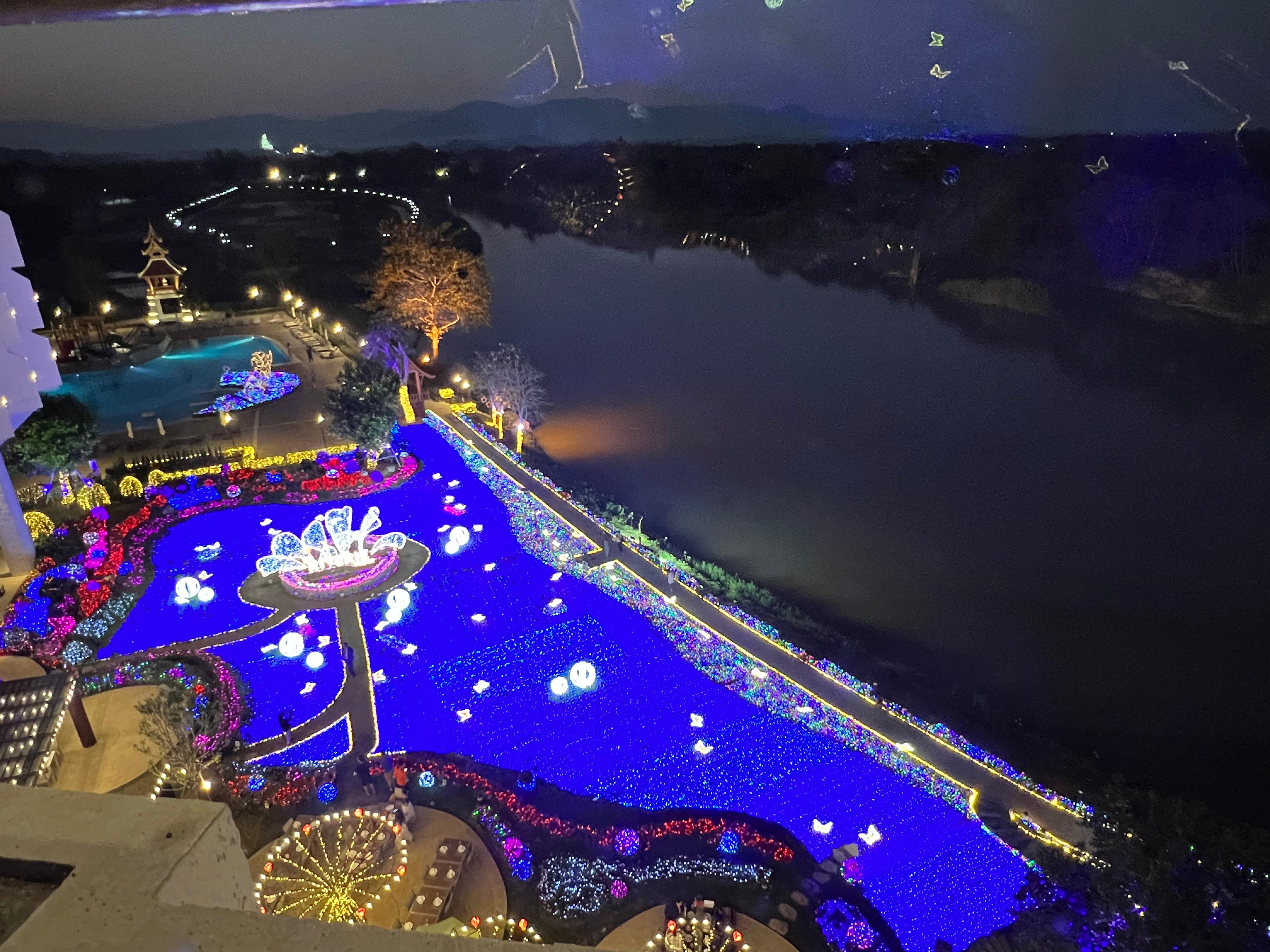 The illuminated gardens behind the hotel viewed from our room