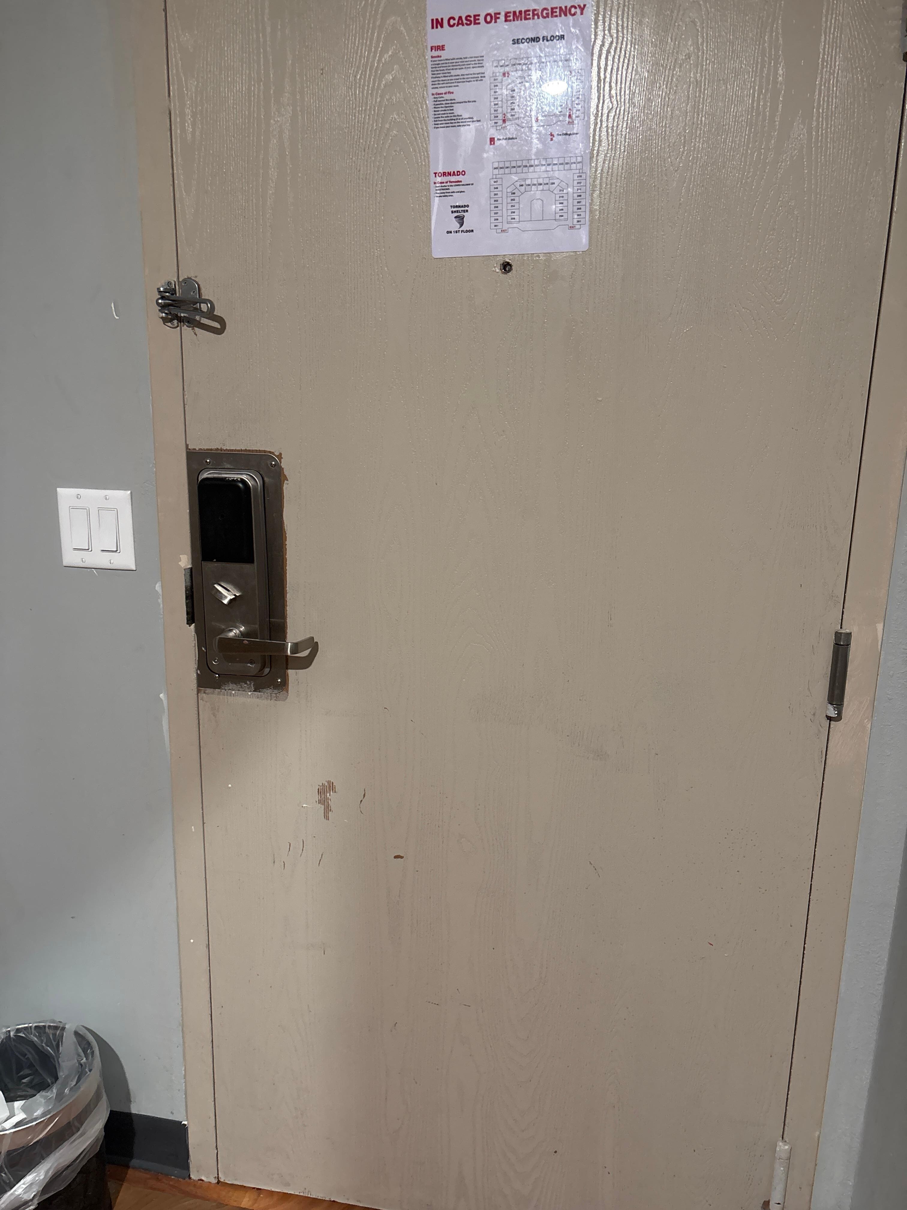 Doors unpainted, lock is loose 