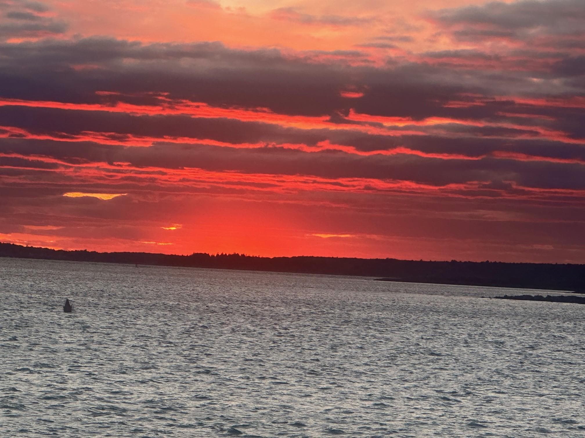 Sunset view of Harbor from back patio of property.