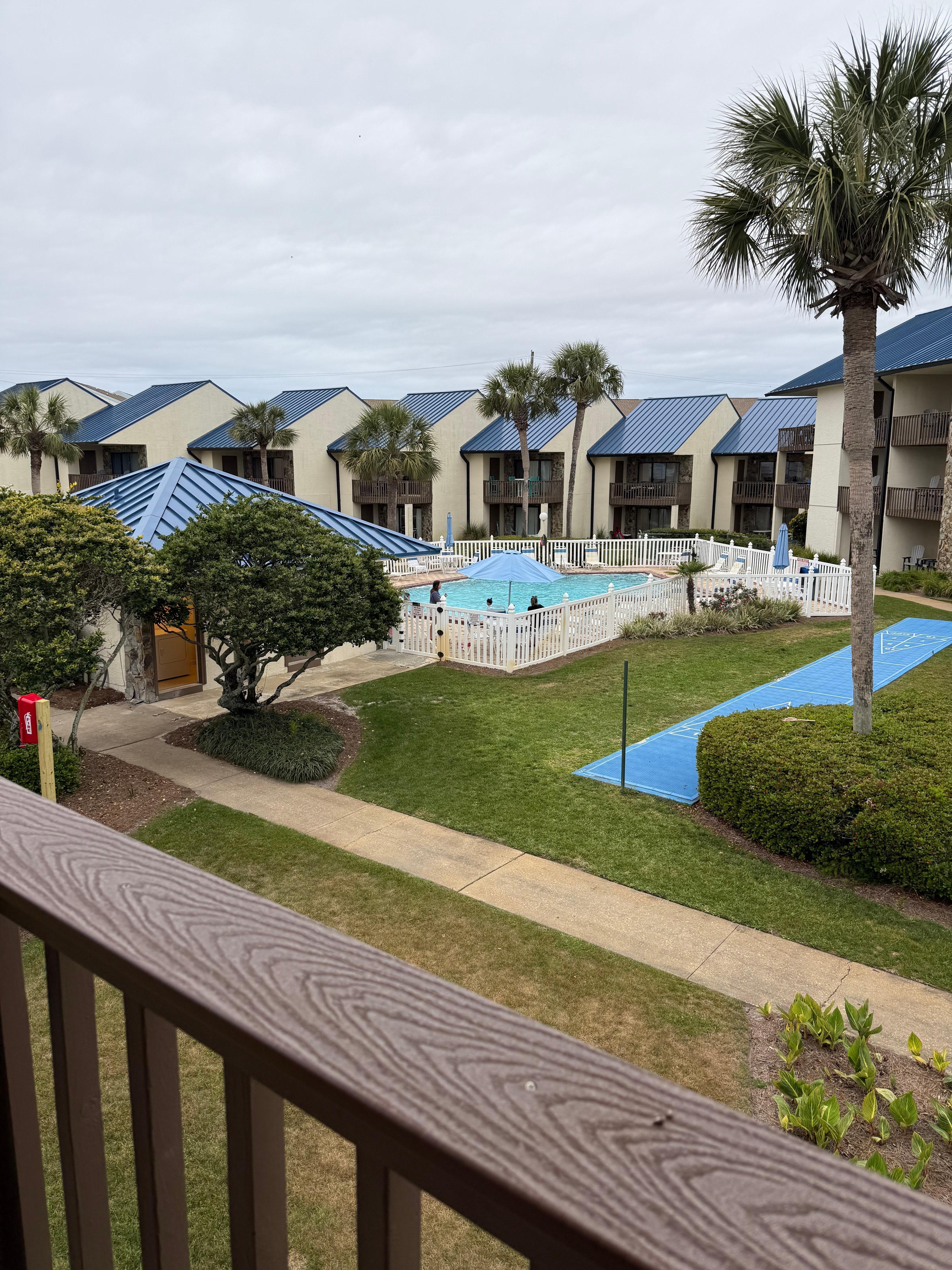 From the upper balcony looking over the pool!