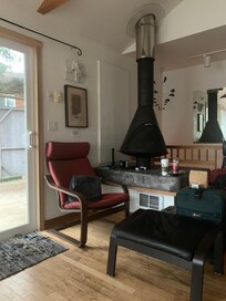 Living room corner with 2chairs, slider to deck