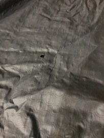 Cigarette burn holes bedspread