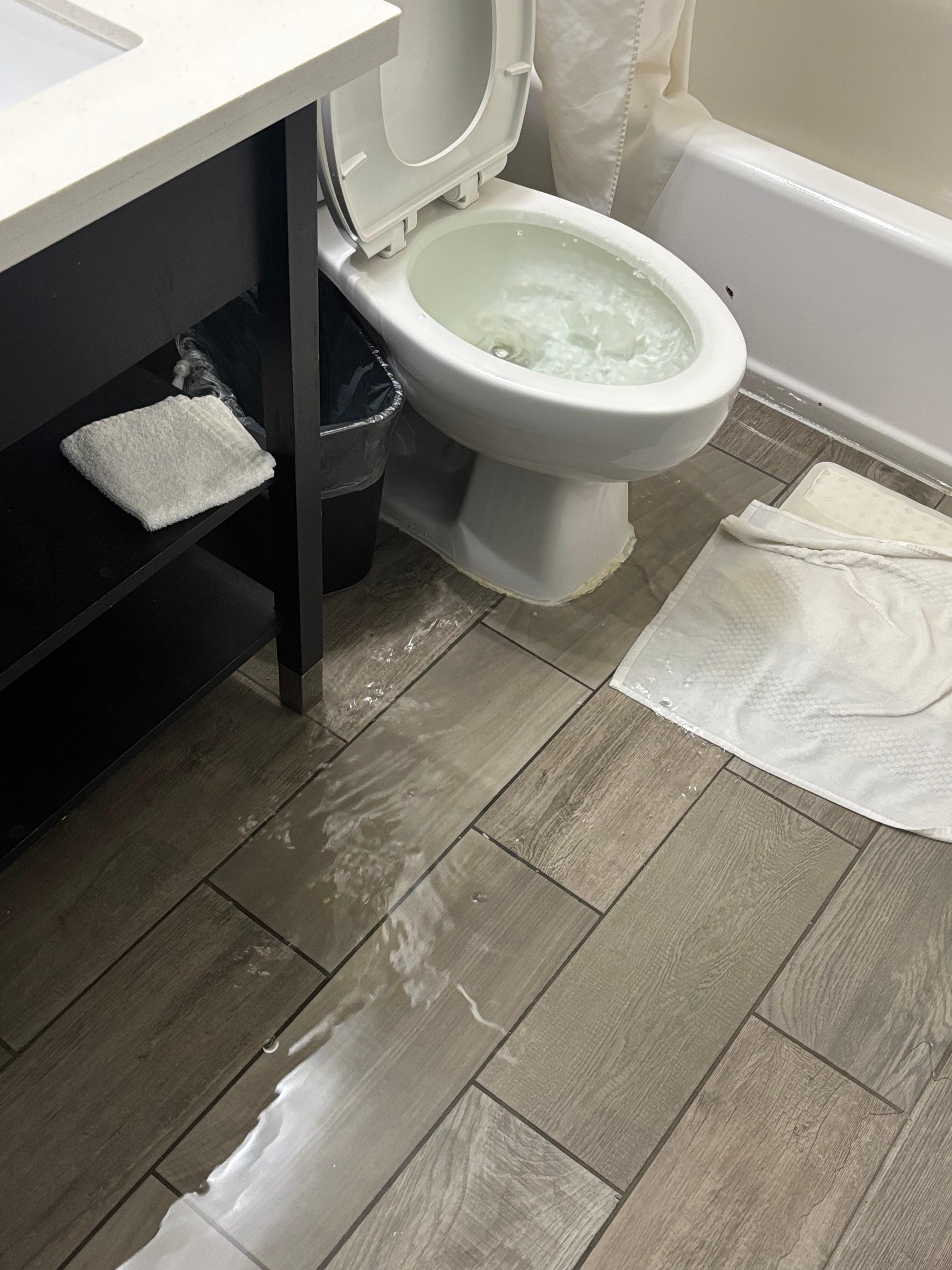 Toilet overflowed and was not able to get a new room.