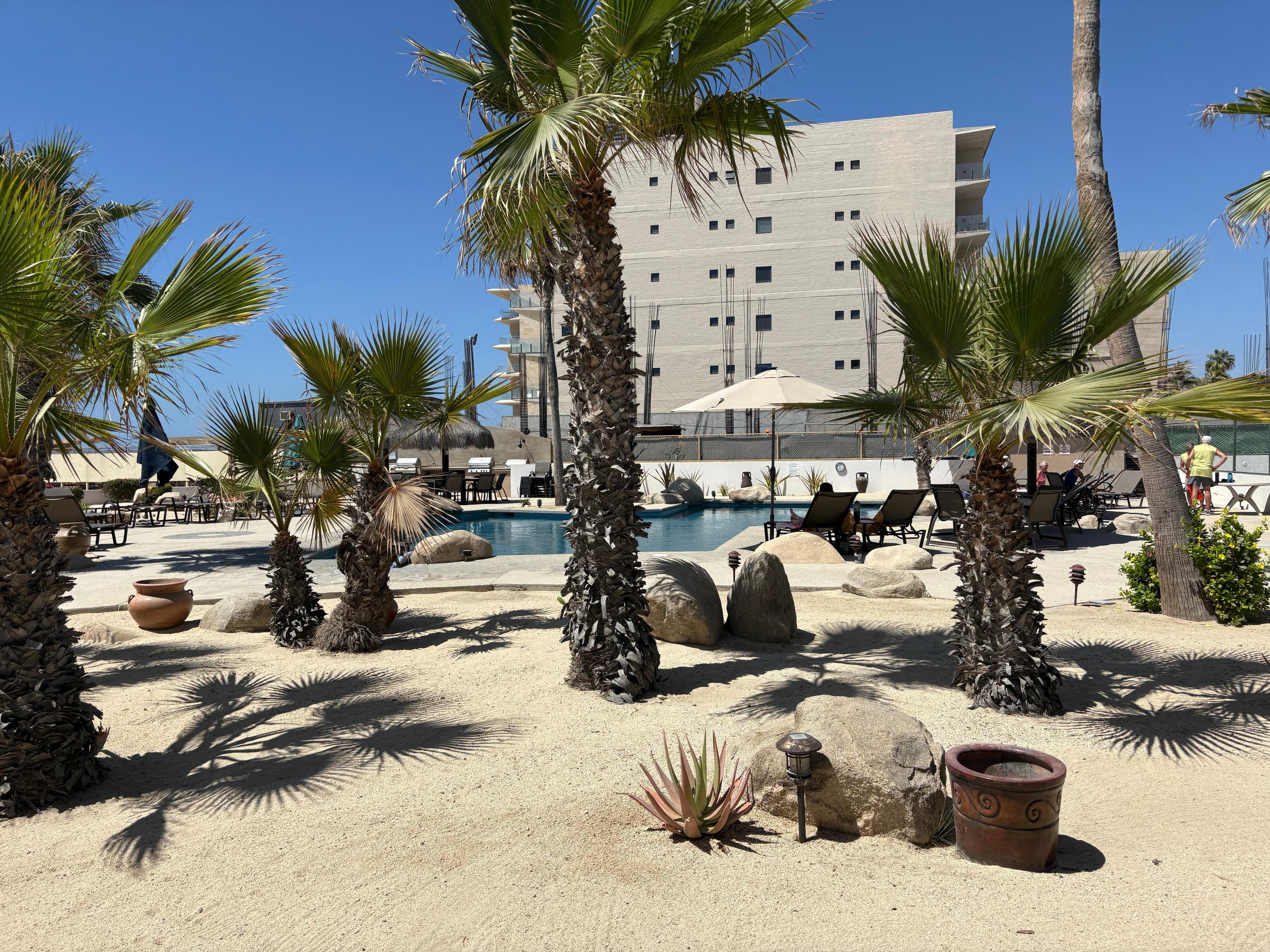 Daytime with endless blue sky and sun at the pool. 