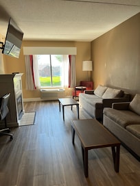 Living area straight ahead when you first walk in