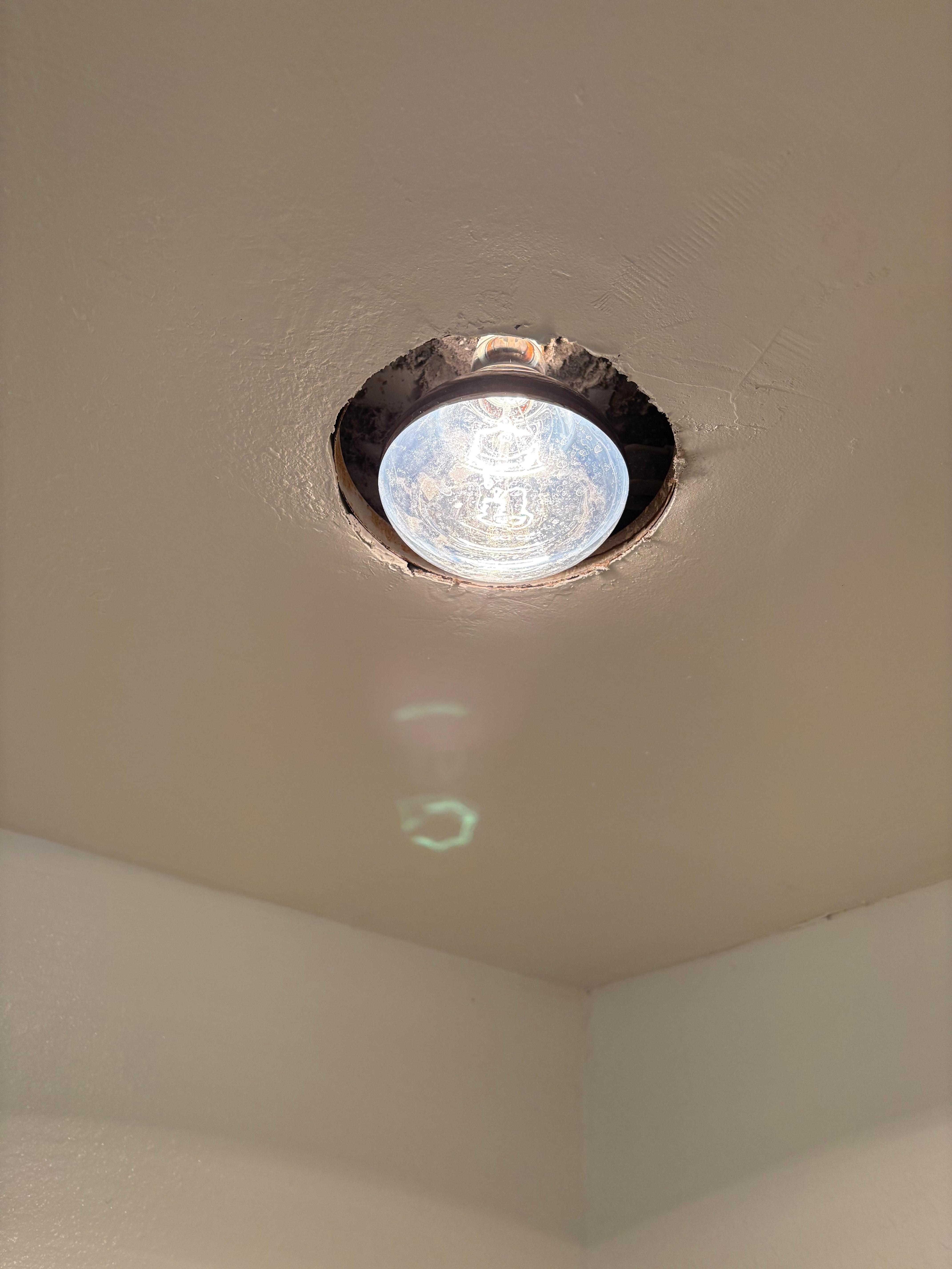 This is inside the shower.  The bulb and the electrical is open to water in the shower