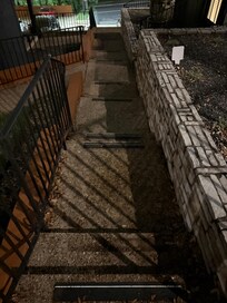 slippery walk up, small stones on concrete