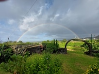 Rainbow as seen from the front porch. Not uncommon.