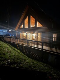 The cabin is so beautiful at night.