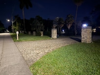 Entrance to driveway has 4 lights; only 1 worked
