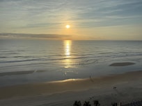 First day sunrise. Most rooms face east. Was on top floor ocean view.