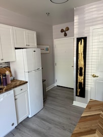 Kitchen and closet had 2 luggage holders iron steamer for clothes