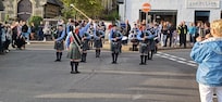 Portree Pipe Band in Square outside hotel
