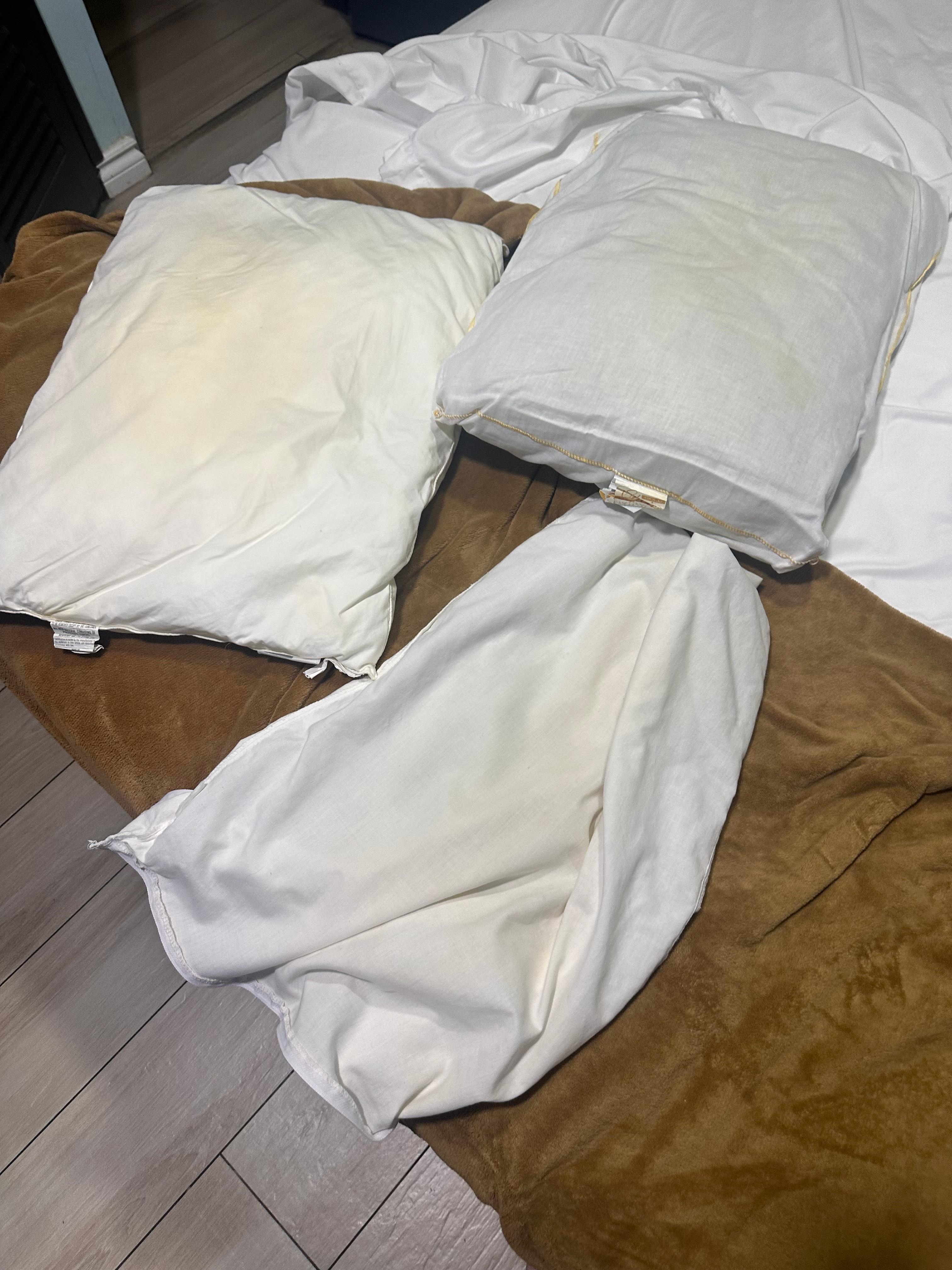 All pillows including replacements were stained nasty and smelled terrible. 🤮🤯🤯😡😱