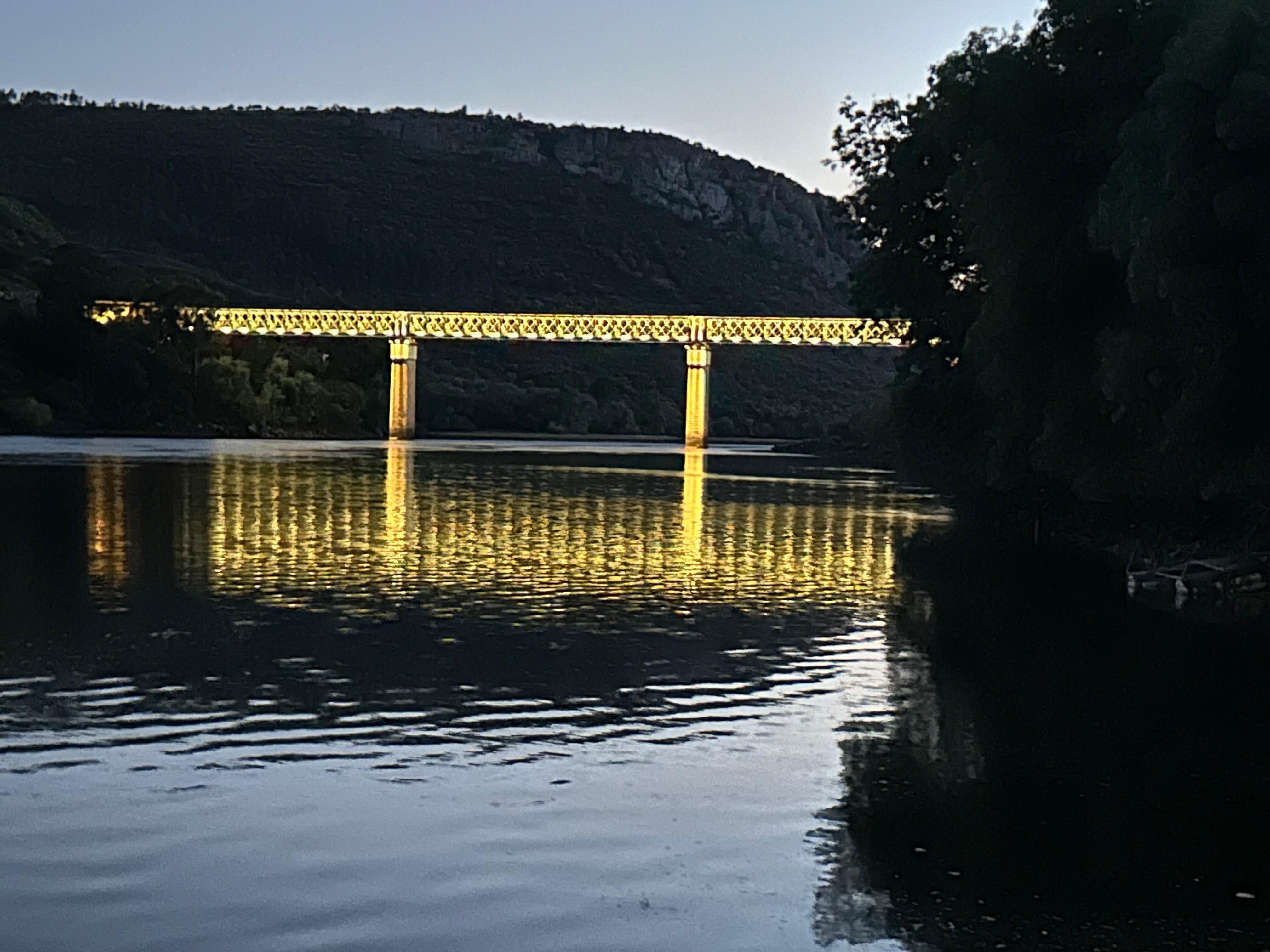 By the river