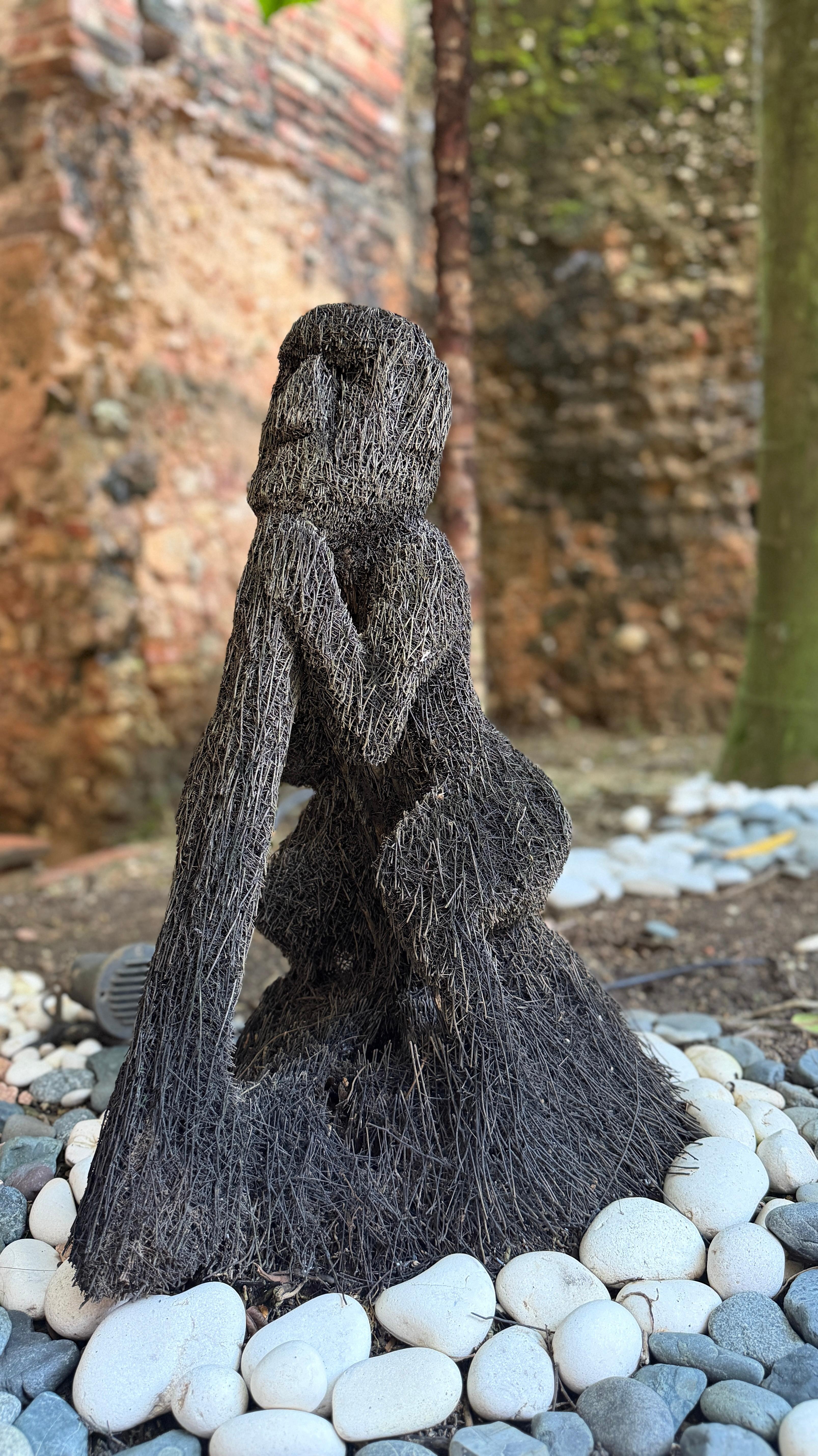 Lovely sculpture out of what appears to be a palm tree root. 