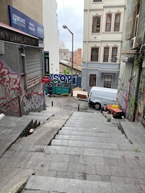 Walk down these steps and hotel is on the right