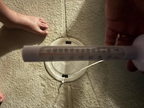 The thermometer after being accused of touching heater. Remain at 80 degrees