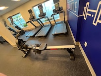 tread mills overlooking pool