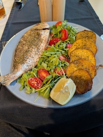 Baked sea bream at hotel restaurant