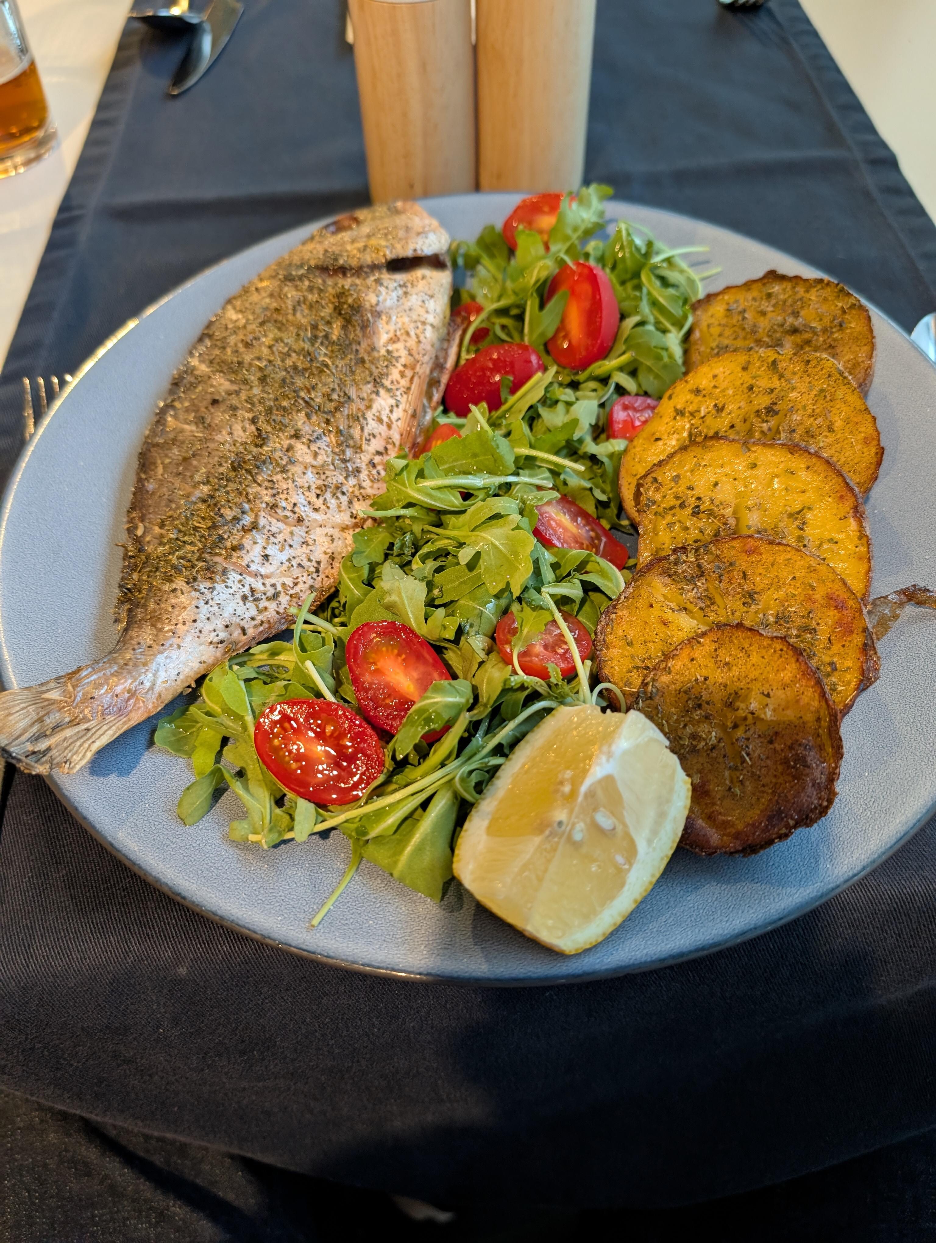 Baked sea bream at hotel restaurant