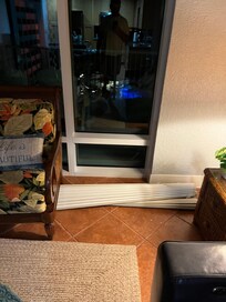 Blinds laying in floor