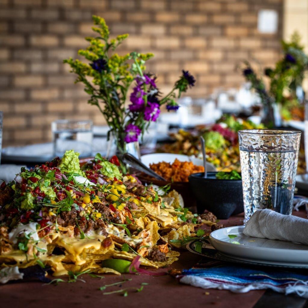 Family dinner at the large outside table. 