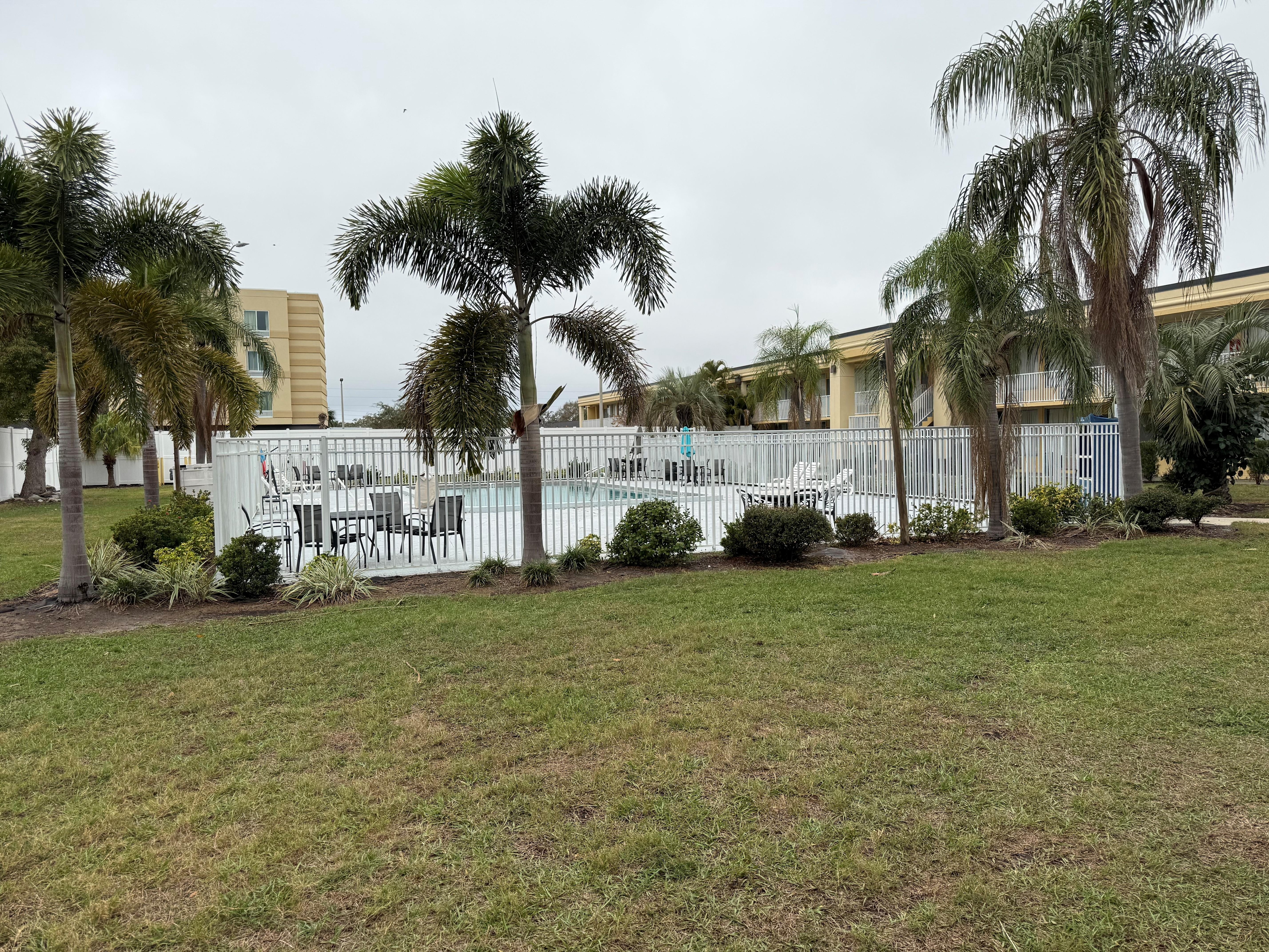 Patio and pool without the gazebo or hot tub that is supposed to be there.