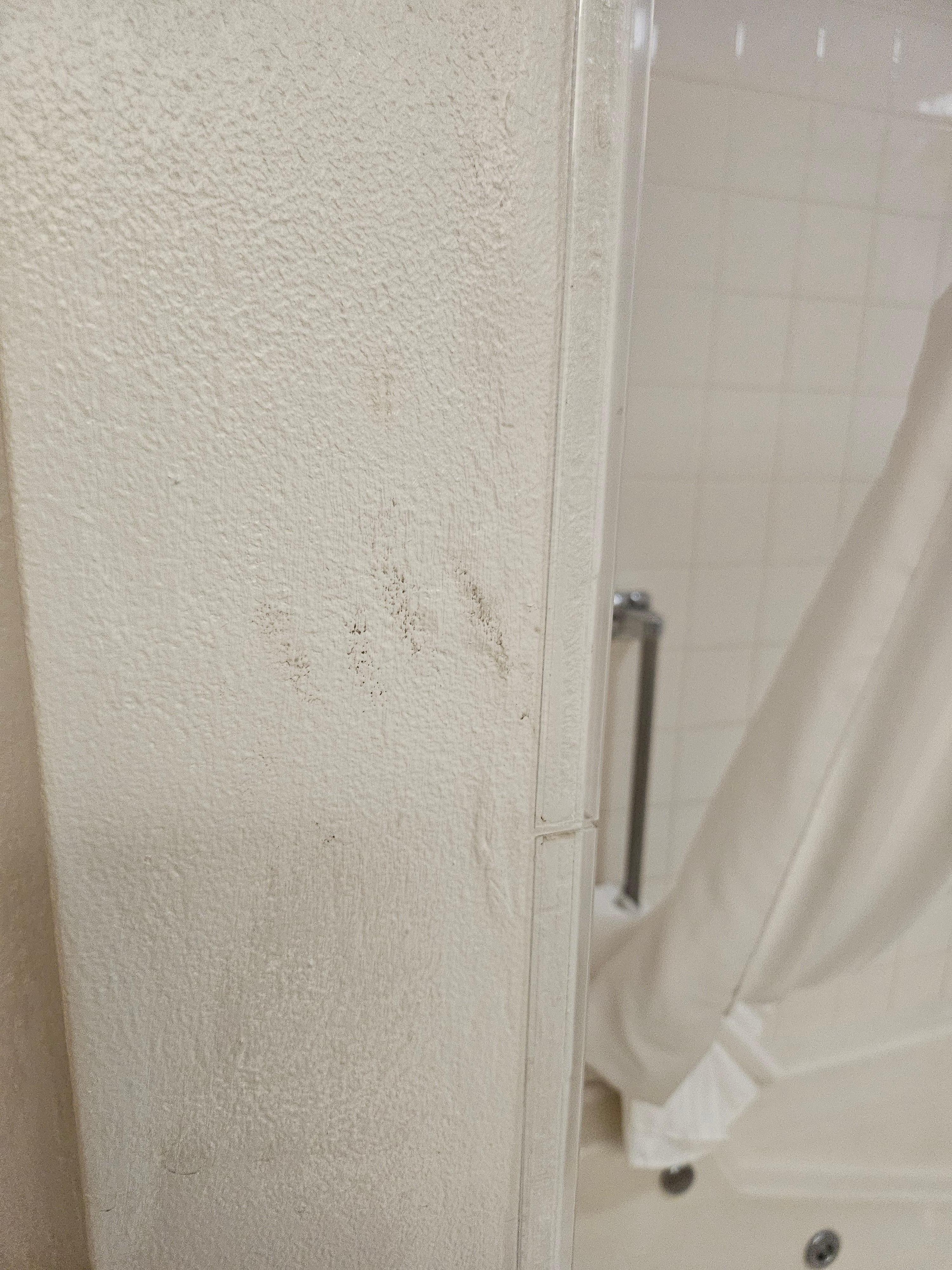 Greasy handprints on walls.