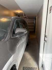 Garage. Not a lot of room to open doors.