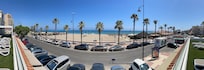 View of the beach from roof terrace