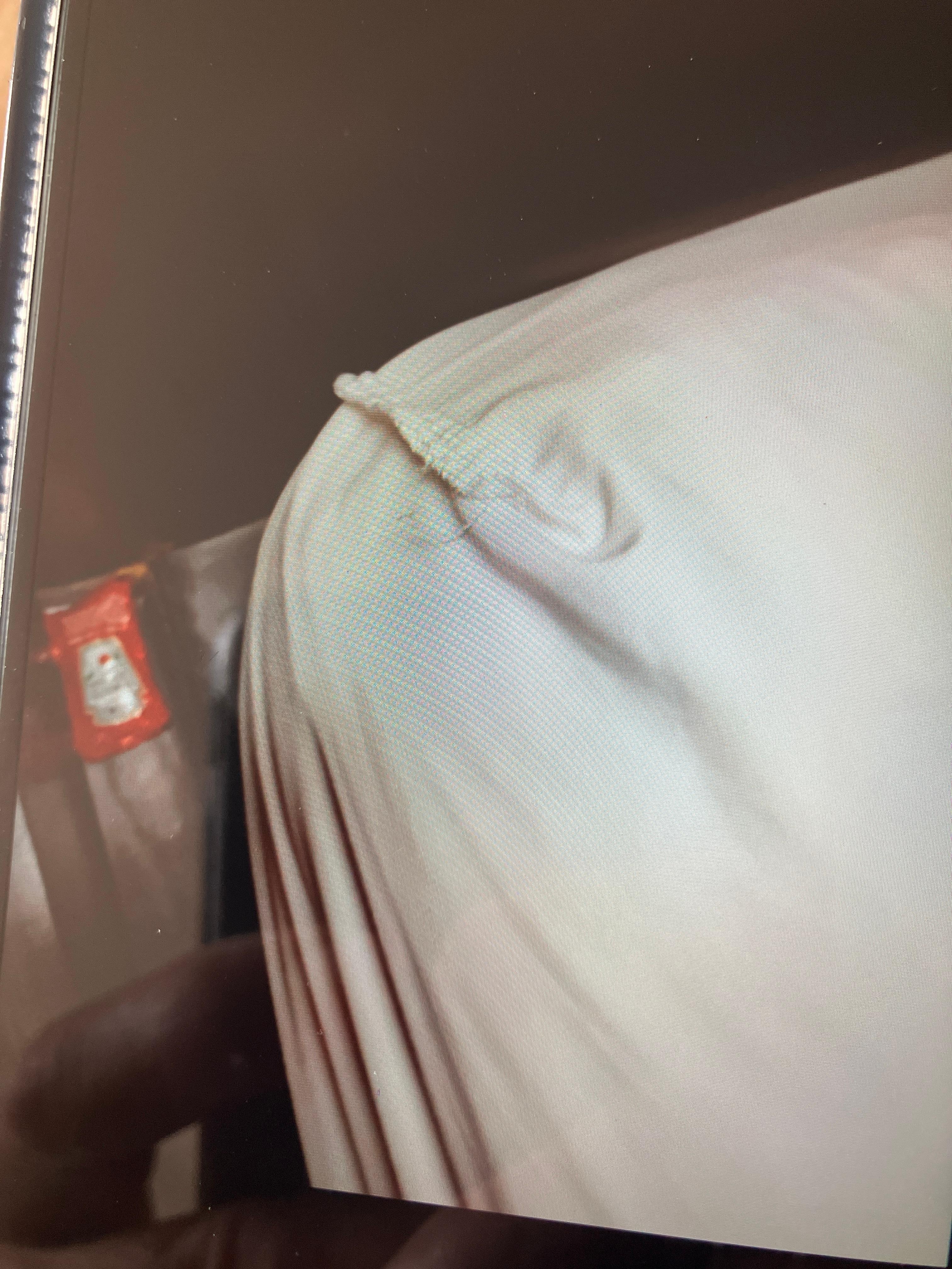 Sheet turned inside out ketchup pack between the bed and stain spilt whatever between the bed and the nightstand