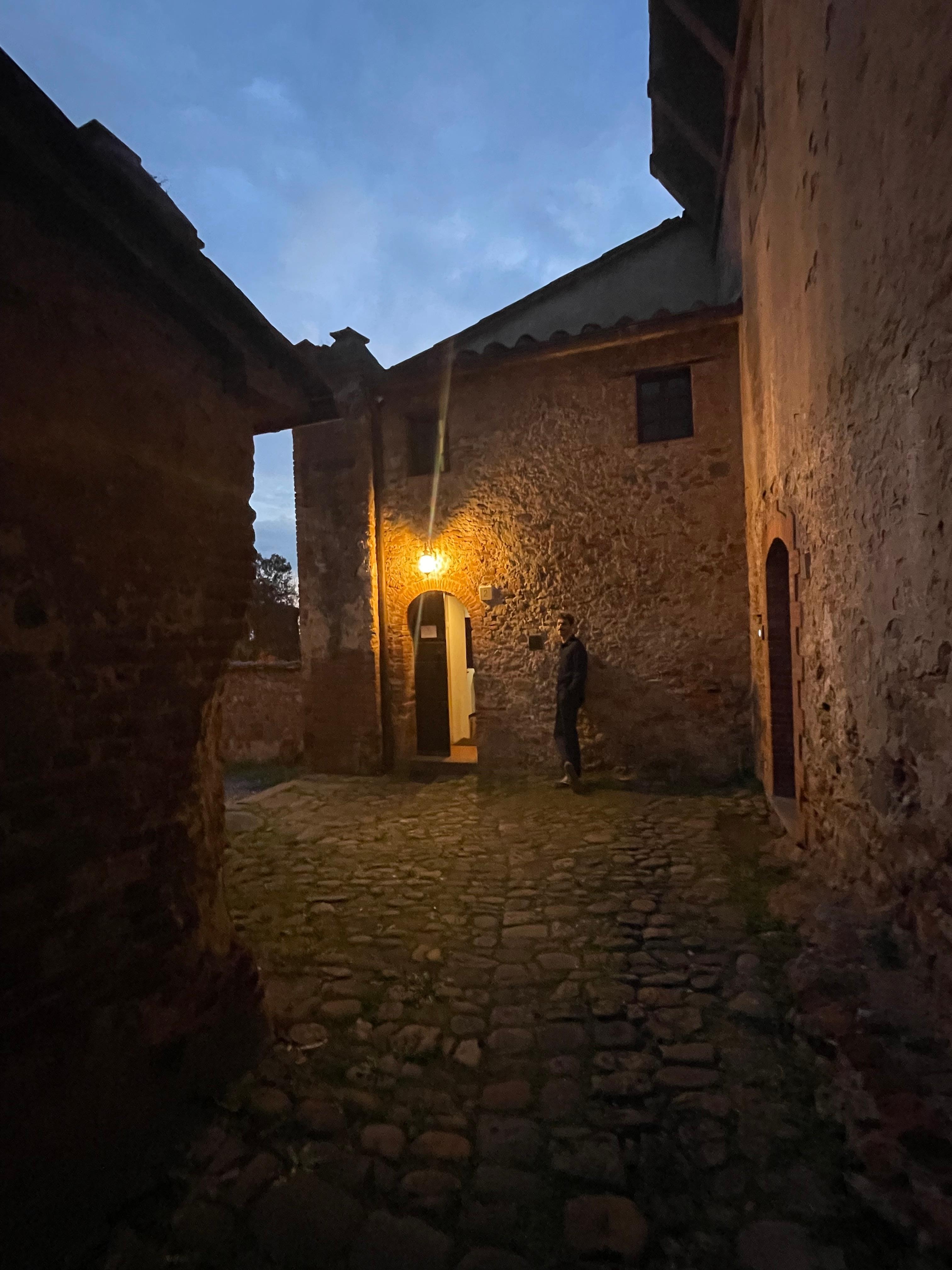 The front entrance at night. 