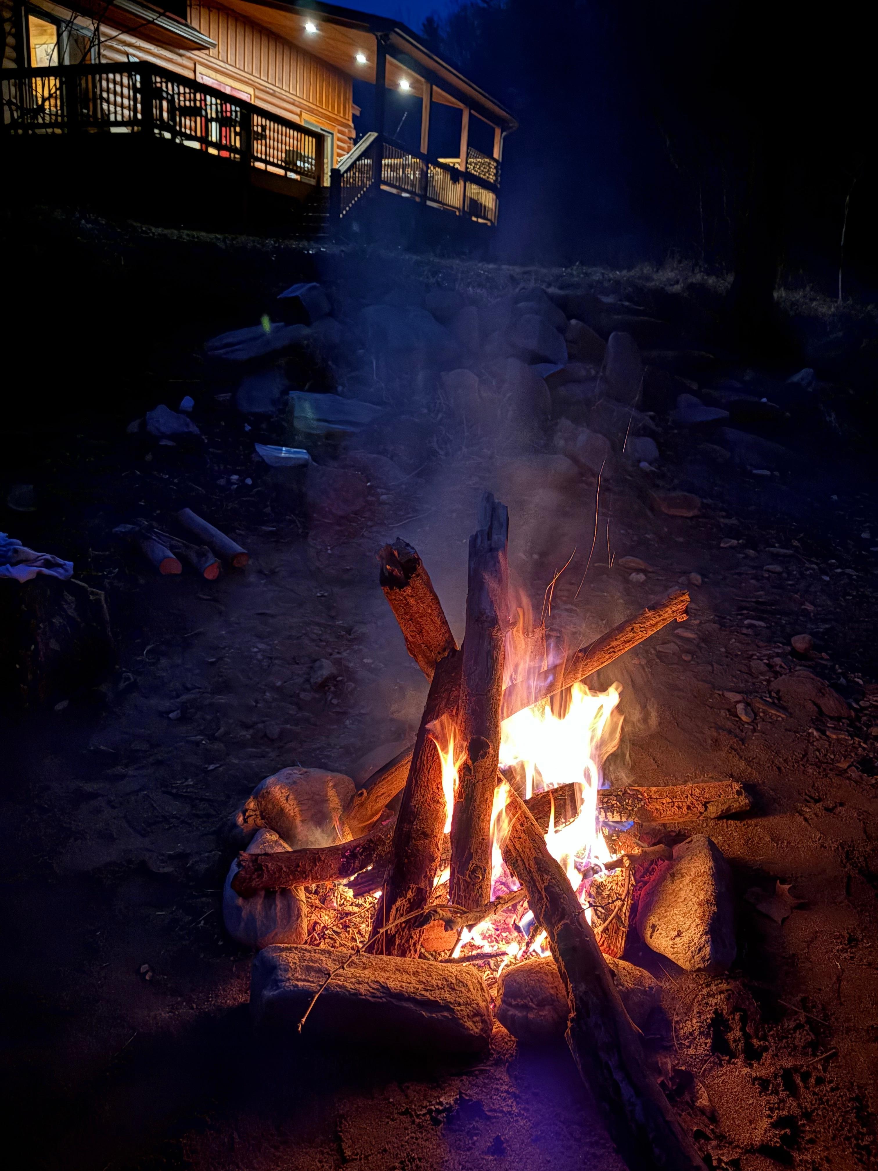 Relaxing campfire on the creek 