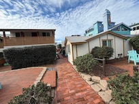 Pathway and courtyard/patio, with the location on the right.