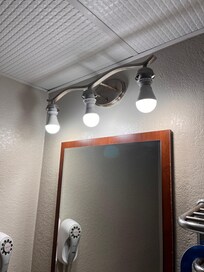 Glass shades gone..... only lightbulbs.