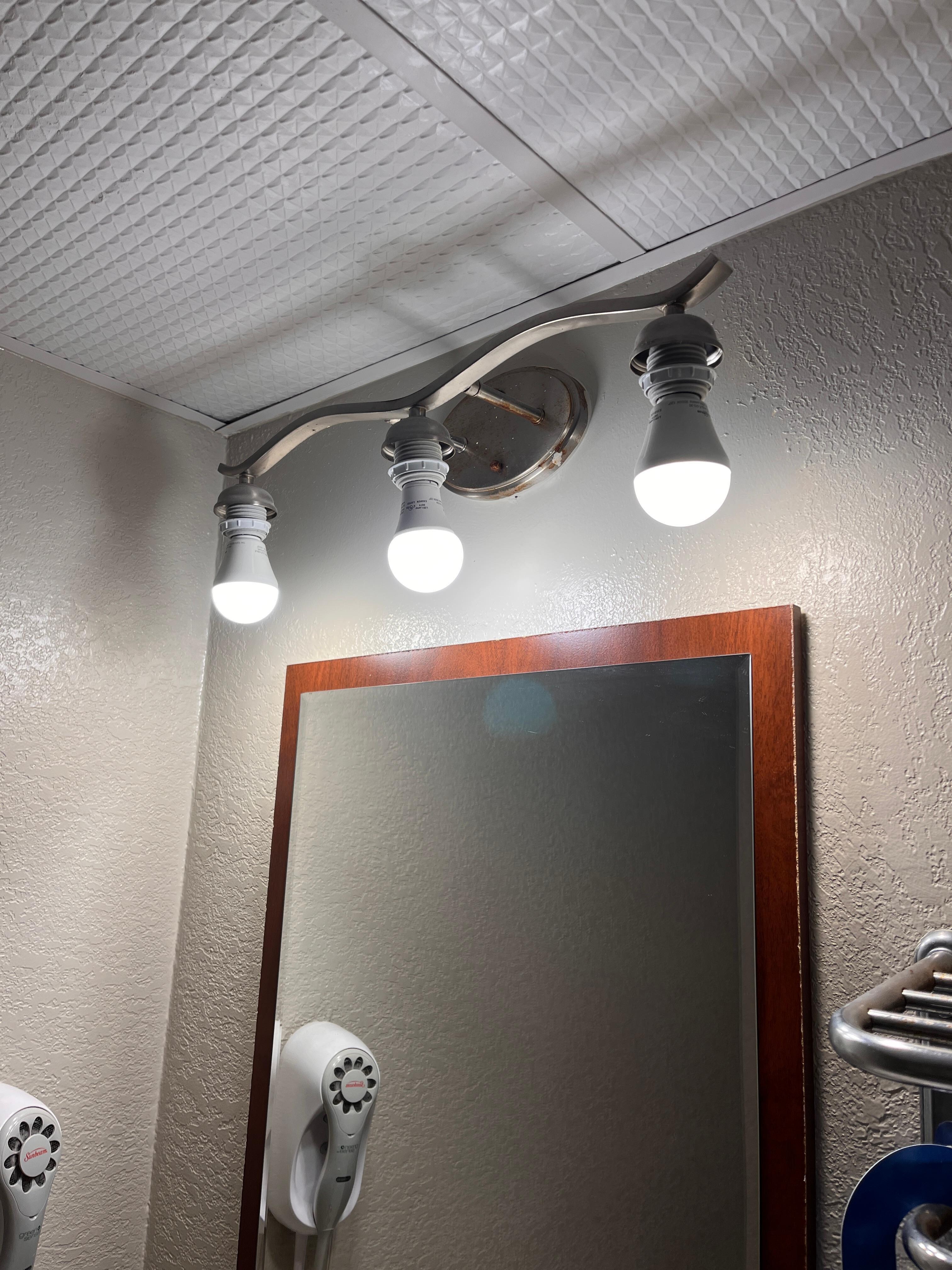 Glass shades gone..... only lightbulbs.