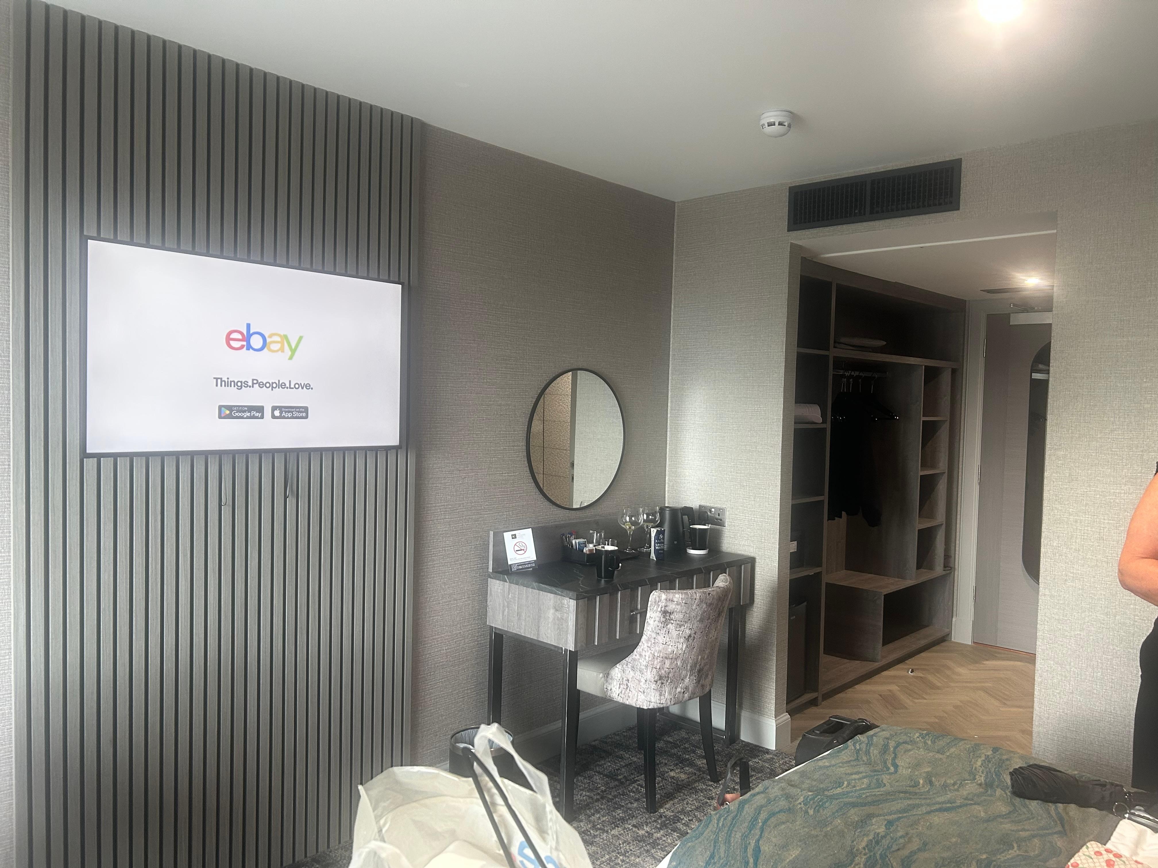 TV area along with tea and coffee making facilities and clothes hanging space