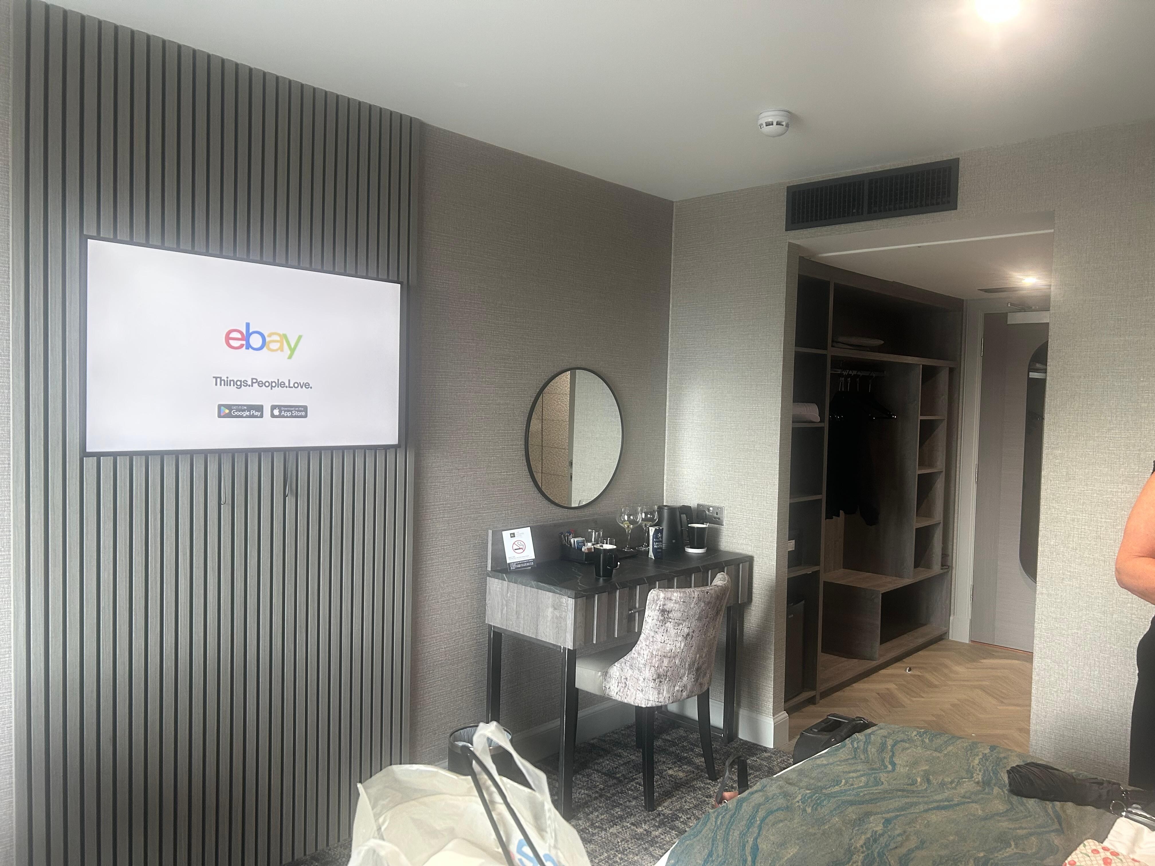 TV area along with tea and coffee making facilities and clothes hanging space