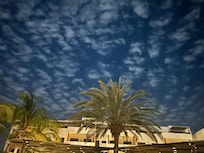 View from poolside chaise lounger
