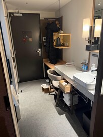 There is a sliding door to separate the room and the washroom area. More privacy.