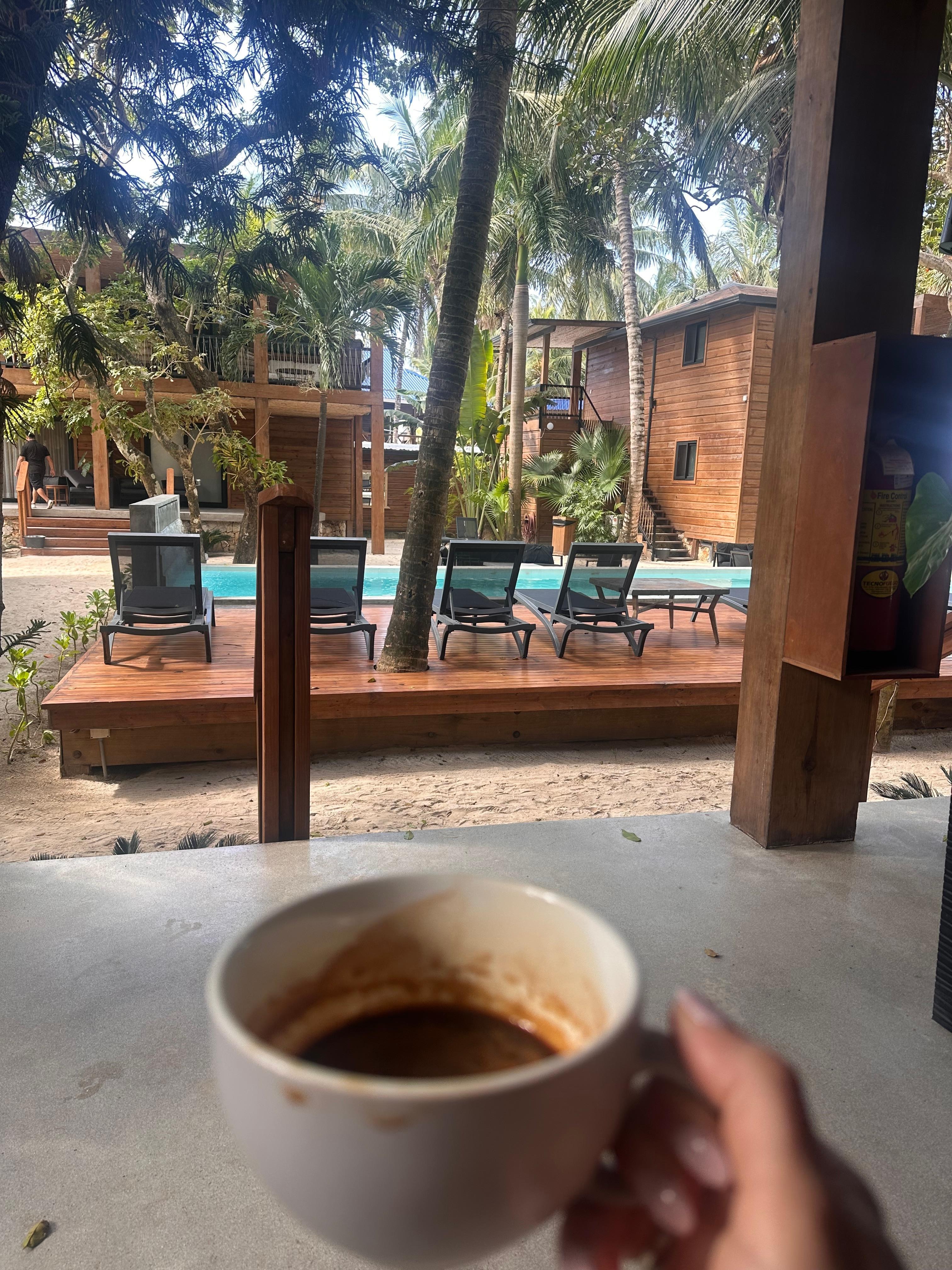 Morning coffee ($6) at our little deck, overlooking the pool. 