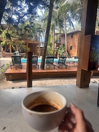 Morning coffee ($6) at our little deck, overlooking the pool.