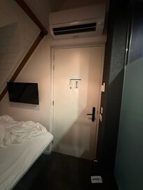This is size of walking space, must put suitcases under bed to get around in room